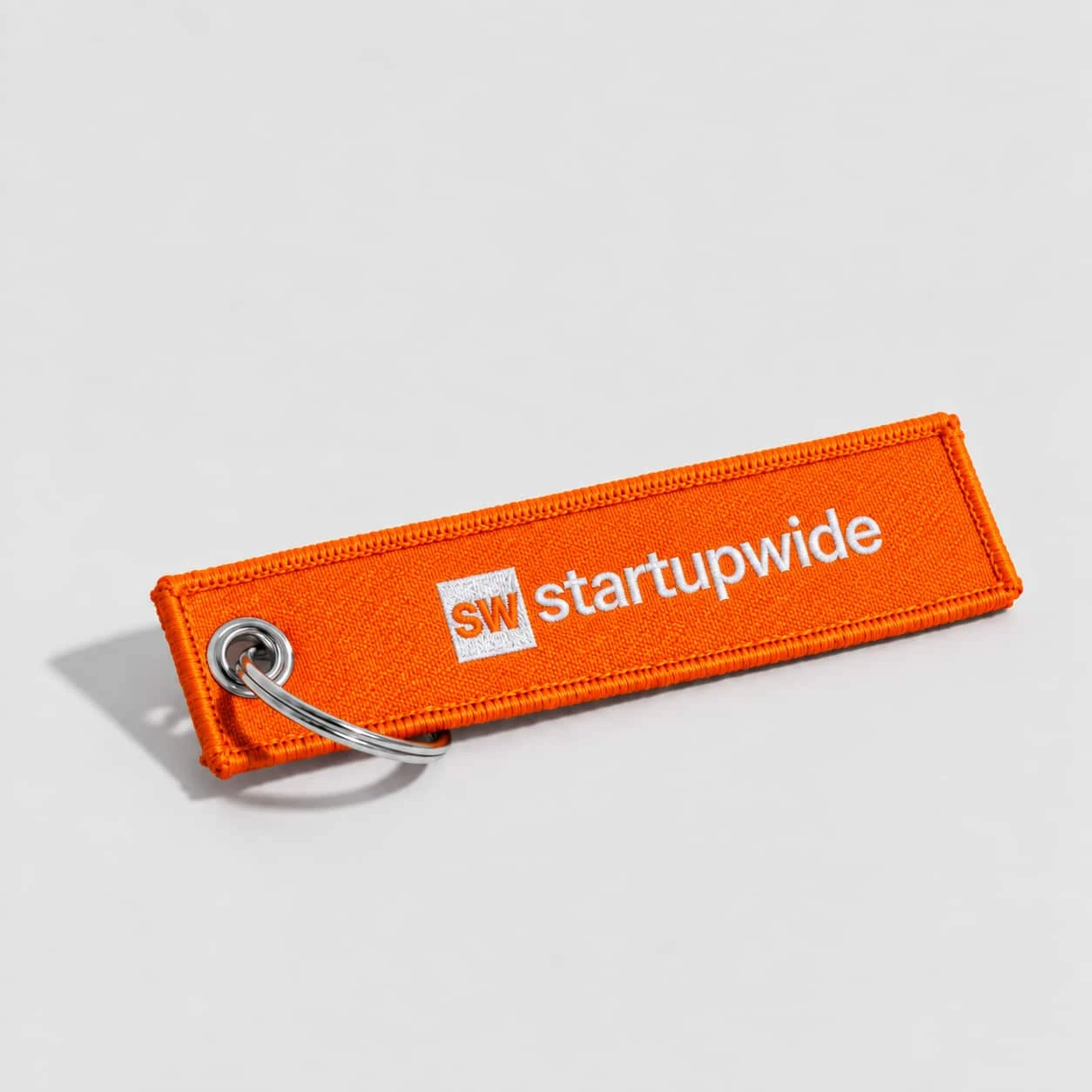 Llaveros personalizados de tela personalizado con logo de empresa - Wyapromo