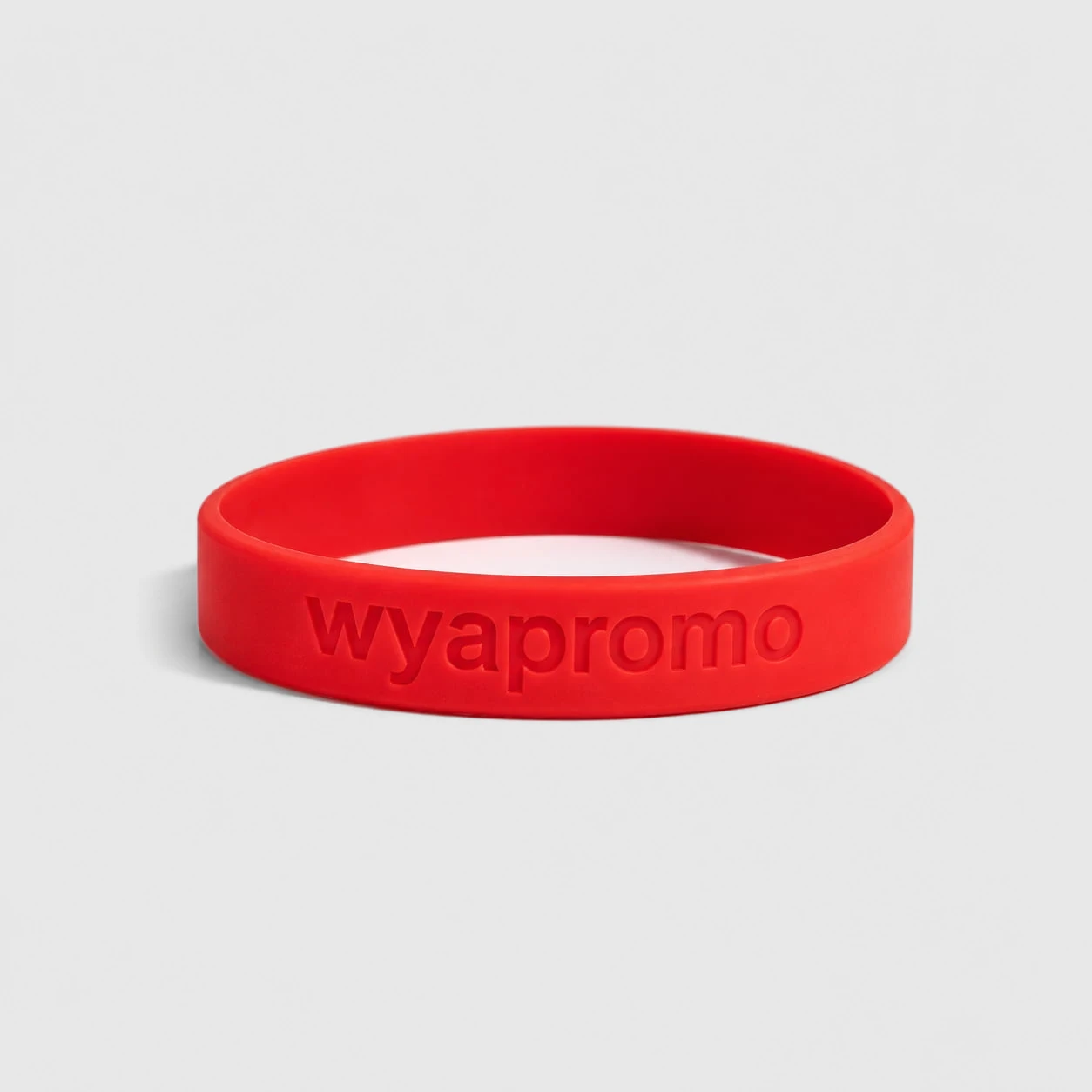 Pulseras de silicona personalizadas bajo relieve personalizado con logo de empresa - Wyapromo